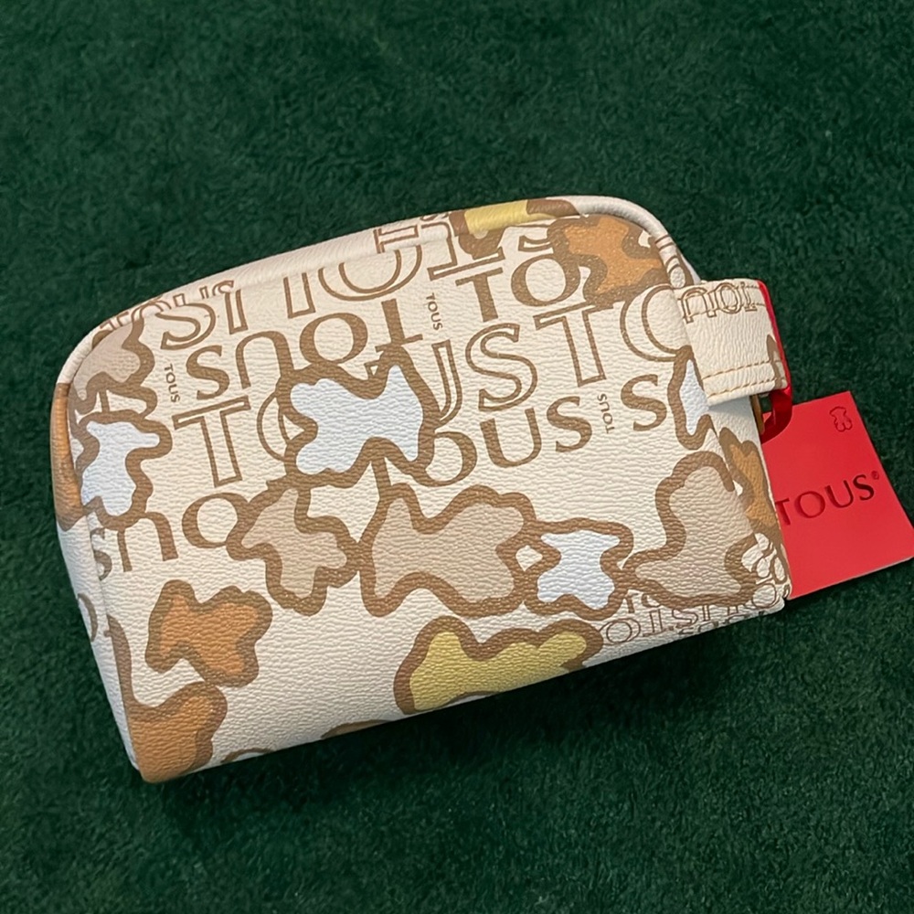 Tous cosmetic bag. New with tags.4” deep, 5” high, 6 “ wide
